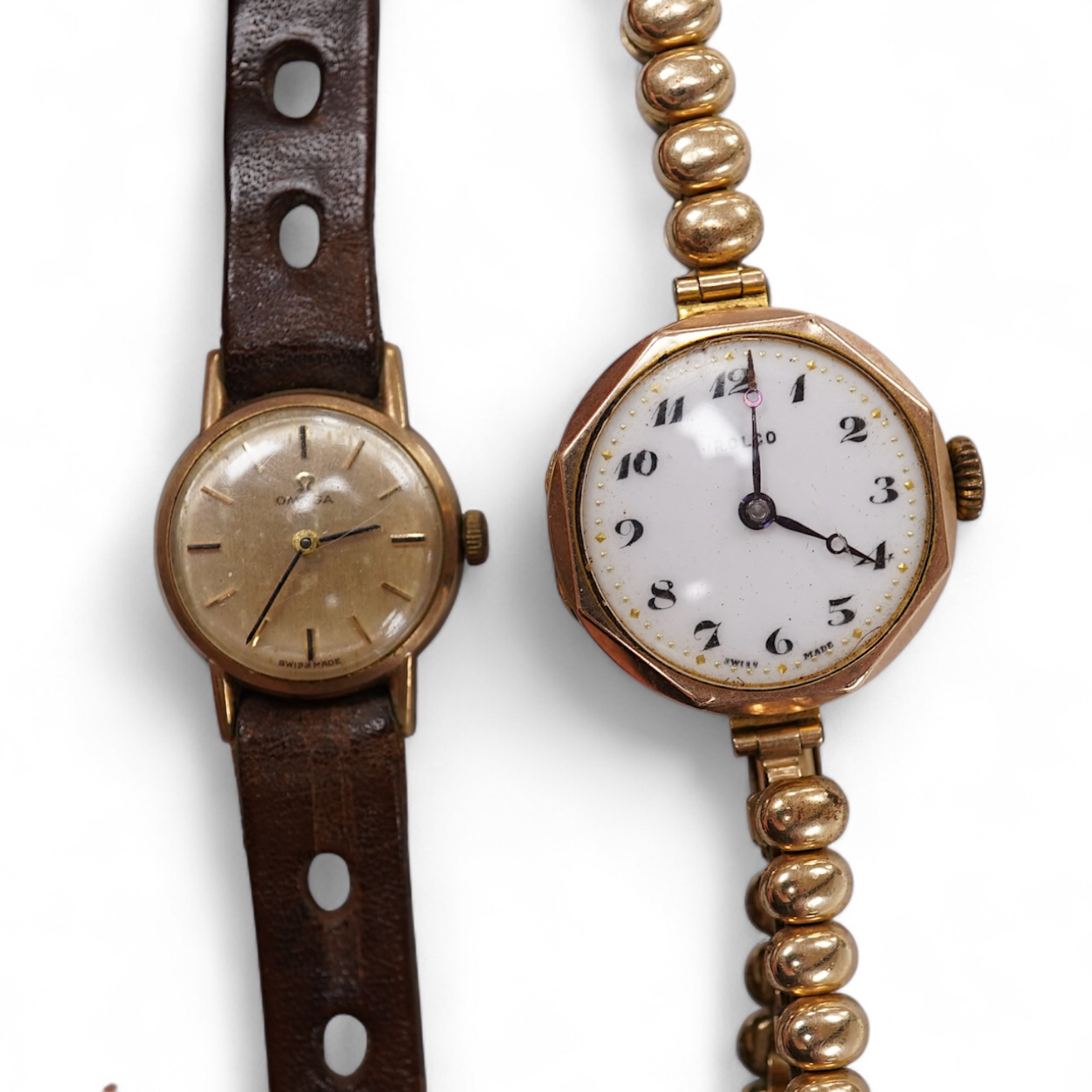 A lady's 9ct Omega manual wind wrist watch, on an associated leather strap, case diameter 20mm, together with a lady's early 20th century 9ct gold Rolco manual wind wrist watch, on a rolled gold bracelet.